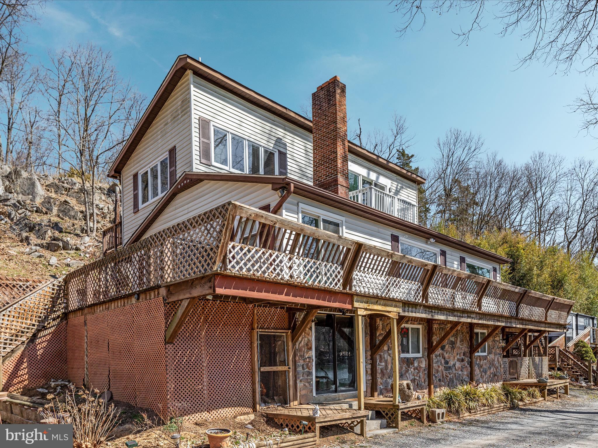 646 Old Dam Road Front Royal, VA 22630 - Photo 33 of 88 a front view of a house with a yard