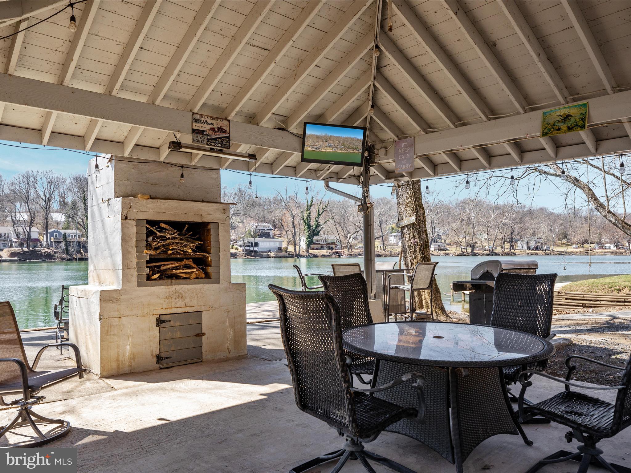 646 Old Dam Road Front Royal, VA 22630 - Photo 38 of 88 a view of a dining room with furniture window and outside view