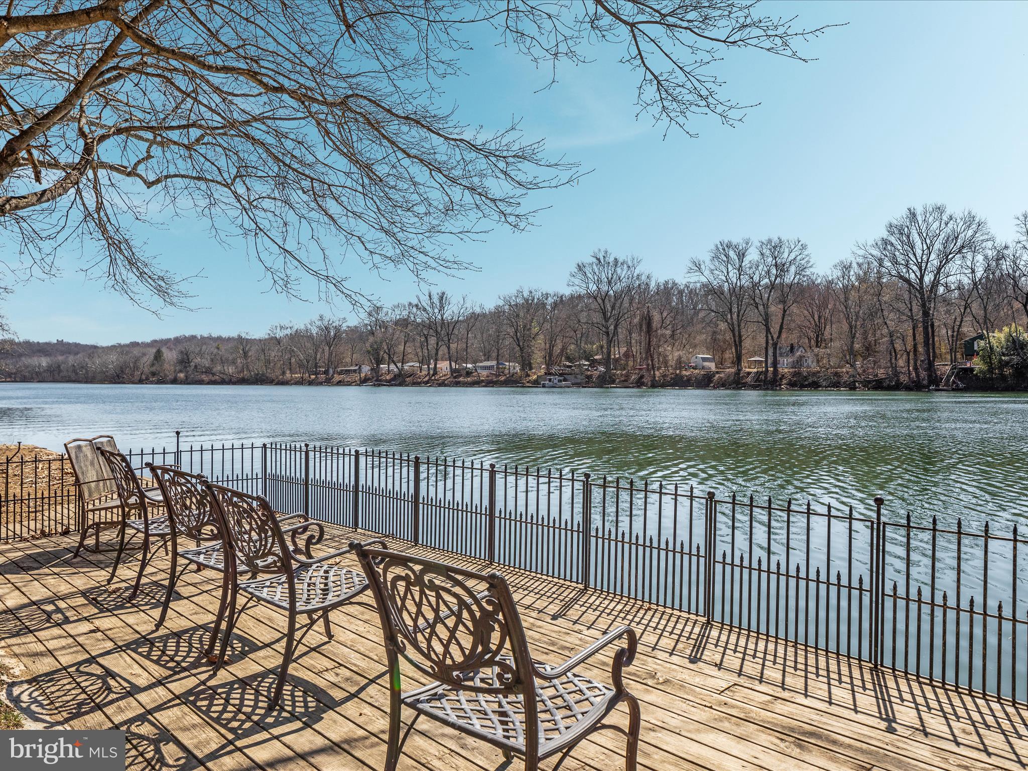 646 Old Dam Road Front Royal, VA 22630 - Photo 41 of 88 a view of a roof deck with wooden floor and fence with a yard