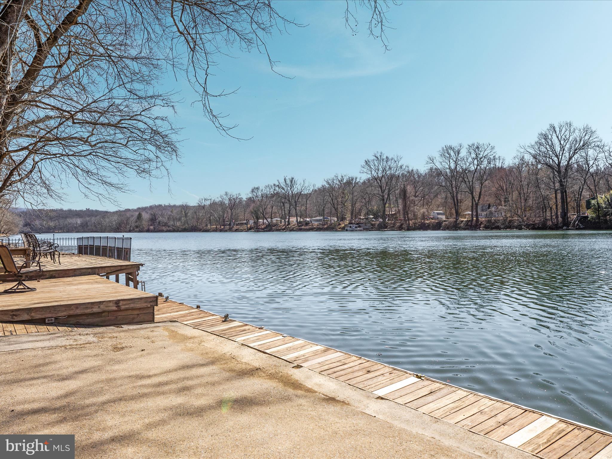 646 Old Dam Road Front Royal, VA 22630 - Photo 42 of 88 a view of a lake with houses