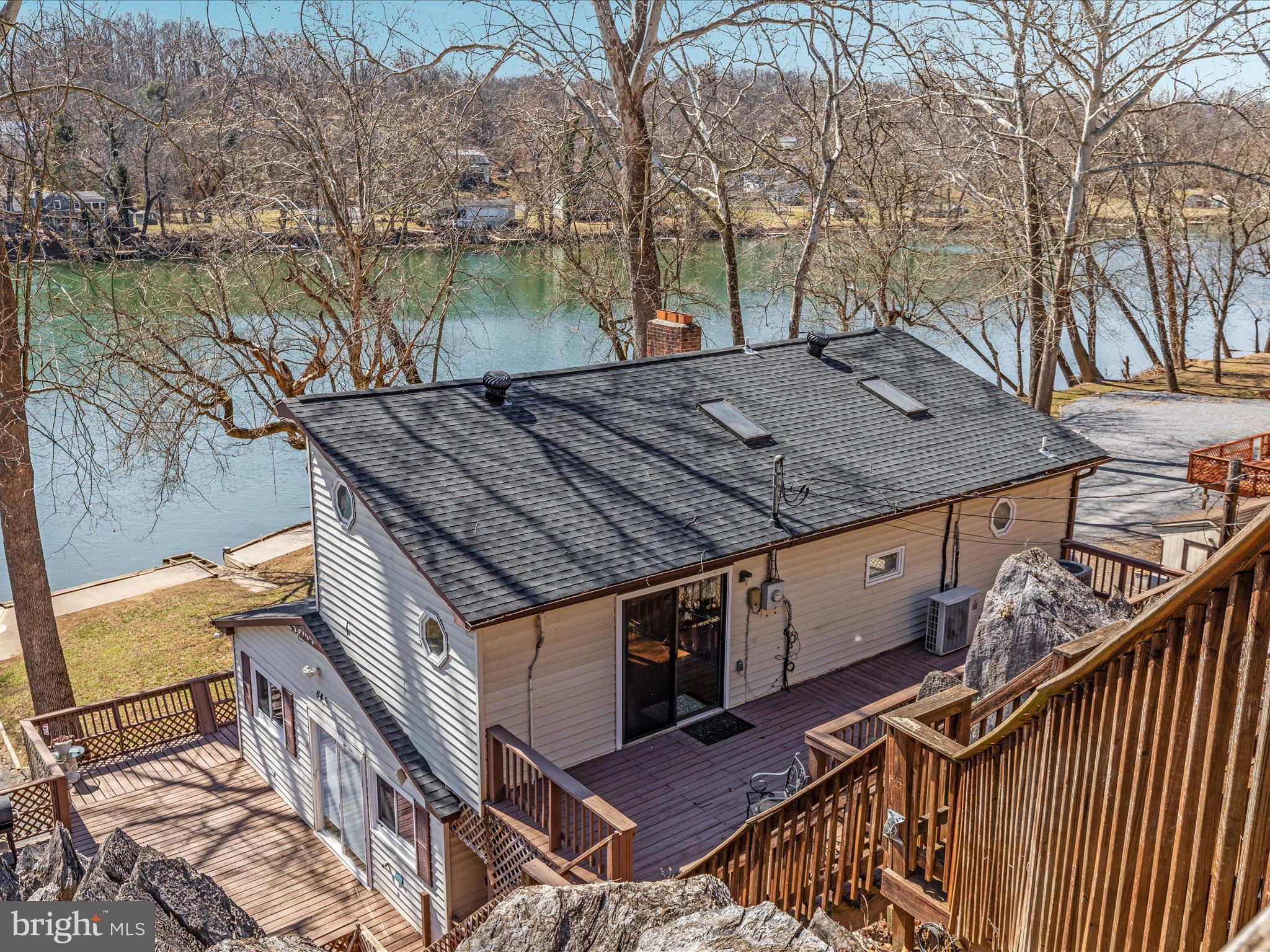 646 Old Dam Road Front Royal, VA 22630 - Photo 46 of 88 a view of a roof deck with wooden fence and floor