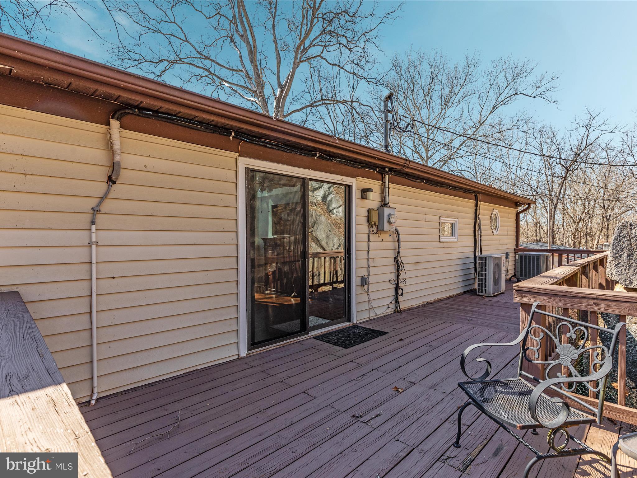 646 Old Dam Road Front Royal, VA 22630 - Photo 48 of 88 a view of a deck with wooden floor and fence