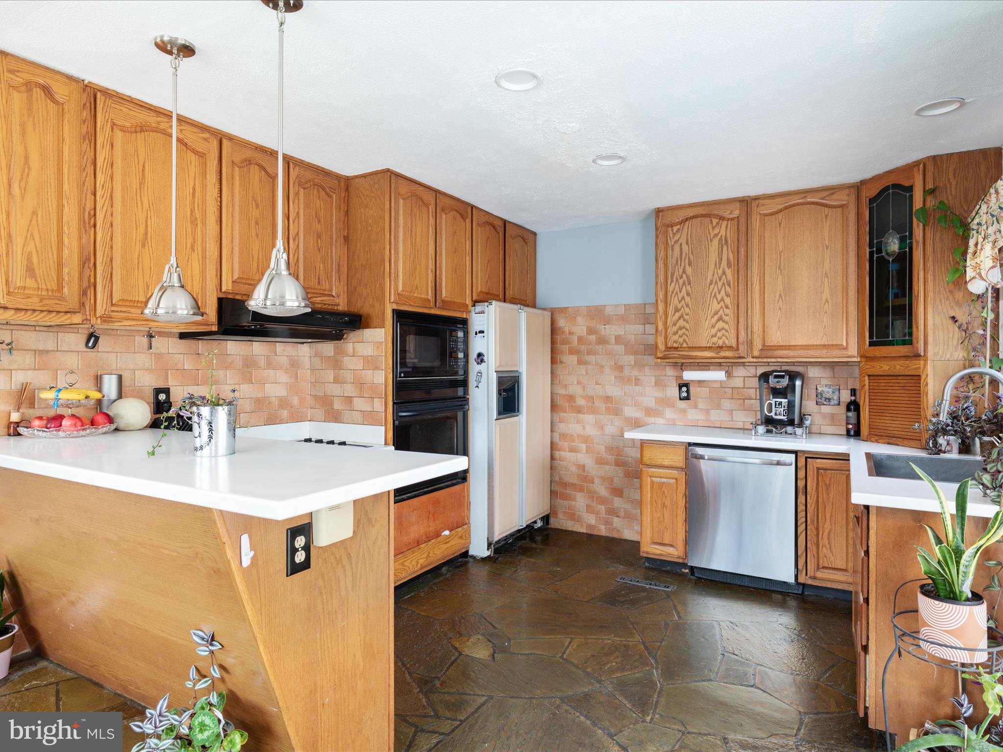 646 Old Dam Road Front Royal, VA 22630 - Photo 6 of 88 a kitchen with a sink stove and refrigerator