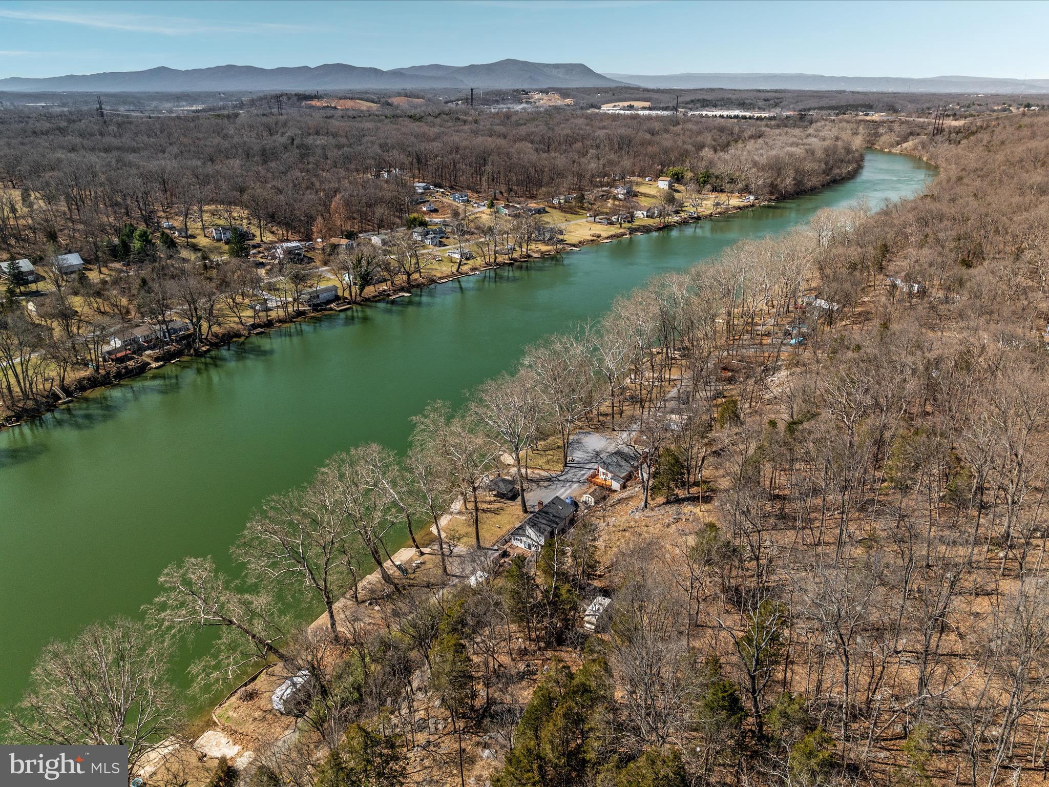 646 Old Dam Road Front Royal, VA 22630 - Photo 66 of 88 a view of a lake with a city