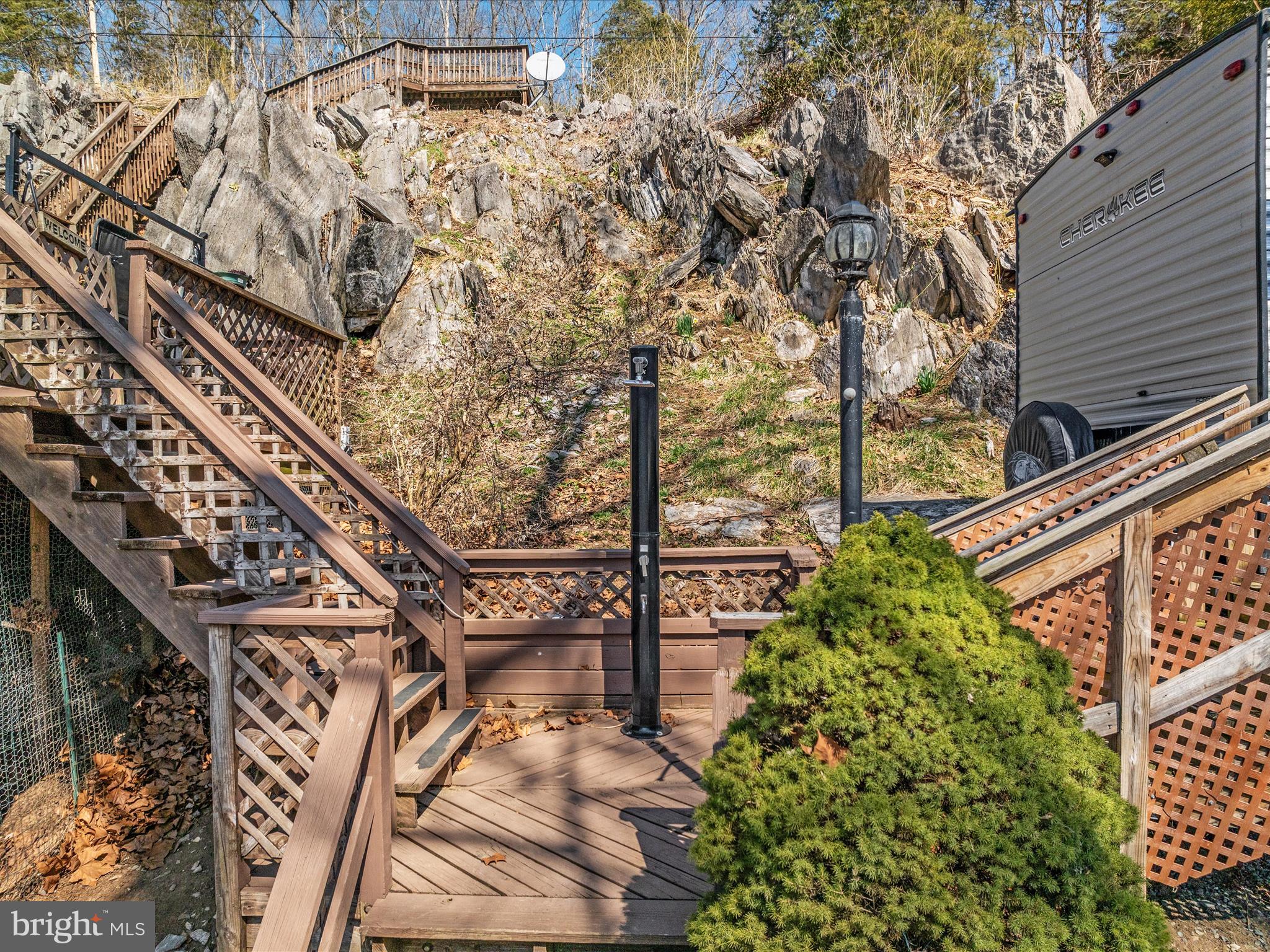 646 Old Dam Road Front Royal, VA 22630 - Photo 69 of 88 a backyard of a building with large trees