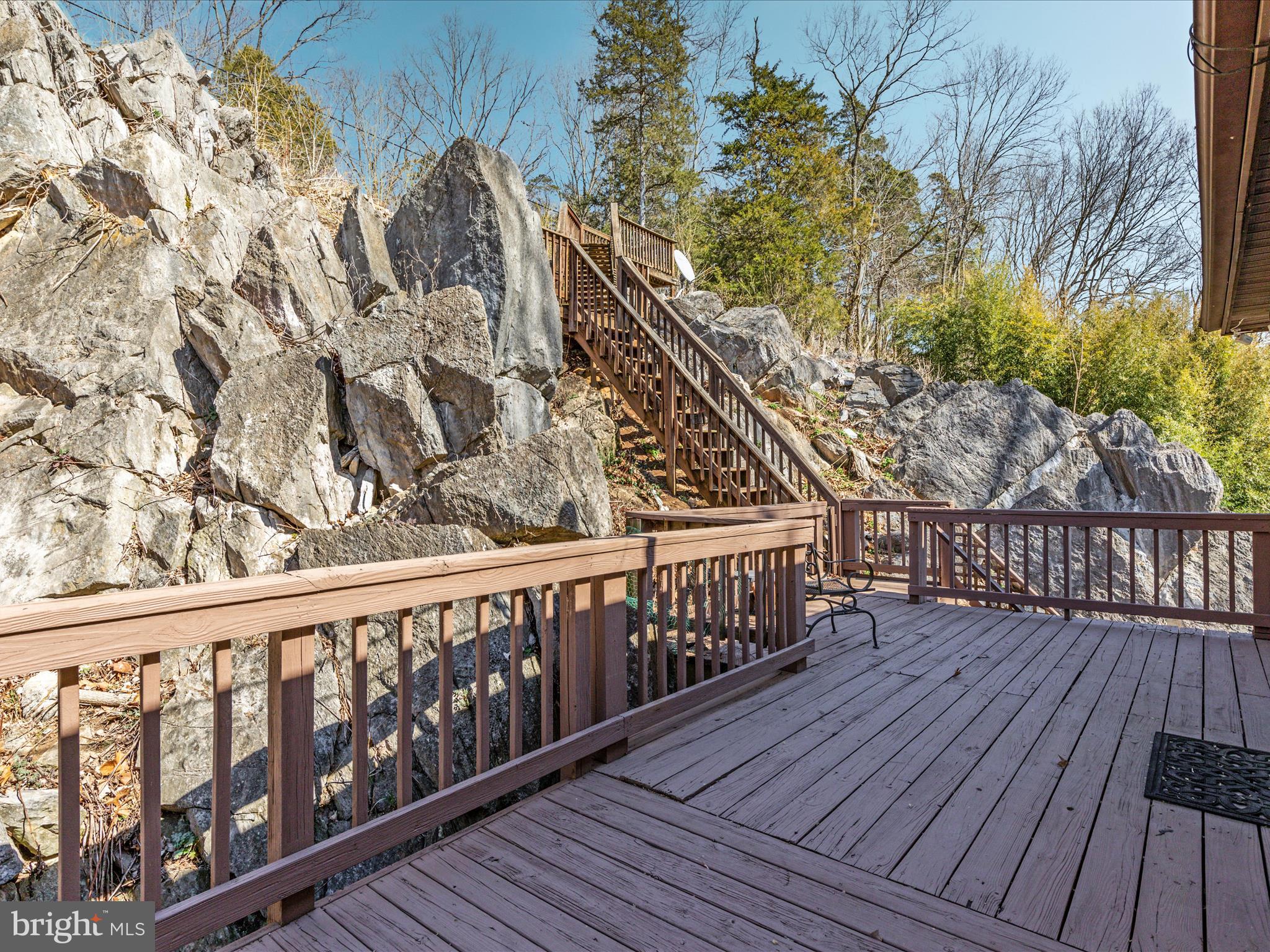 646 Old Dam Road Front Royal, VA 22630 - Photo 75 of 88 Back deck from primary bedroom to widows peek