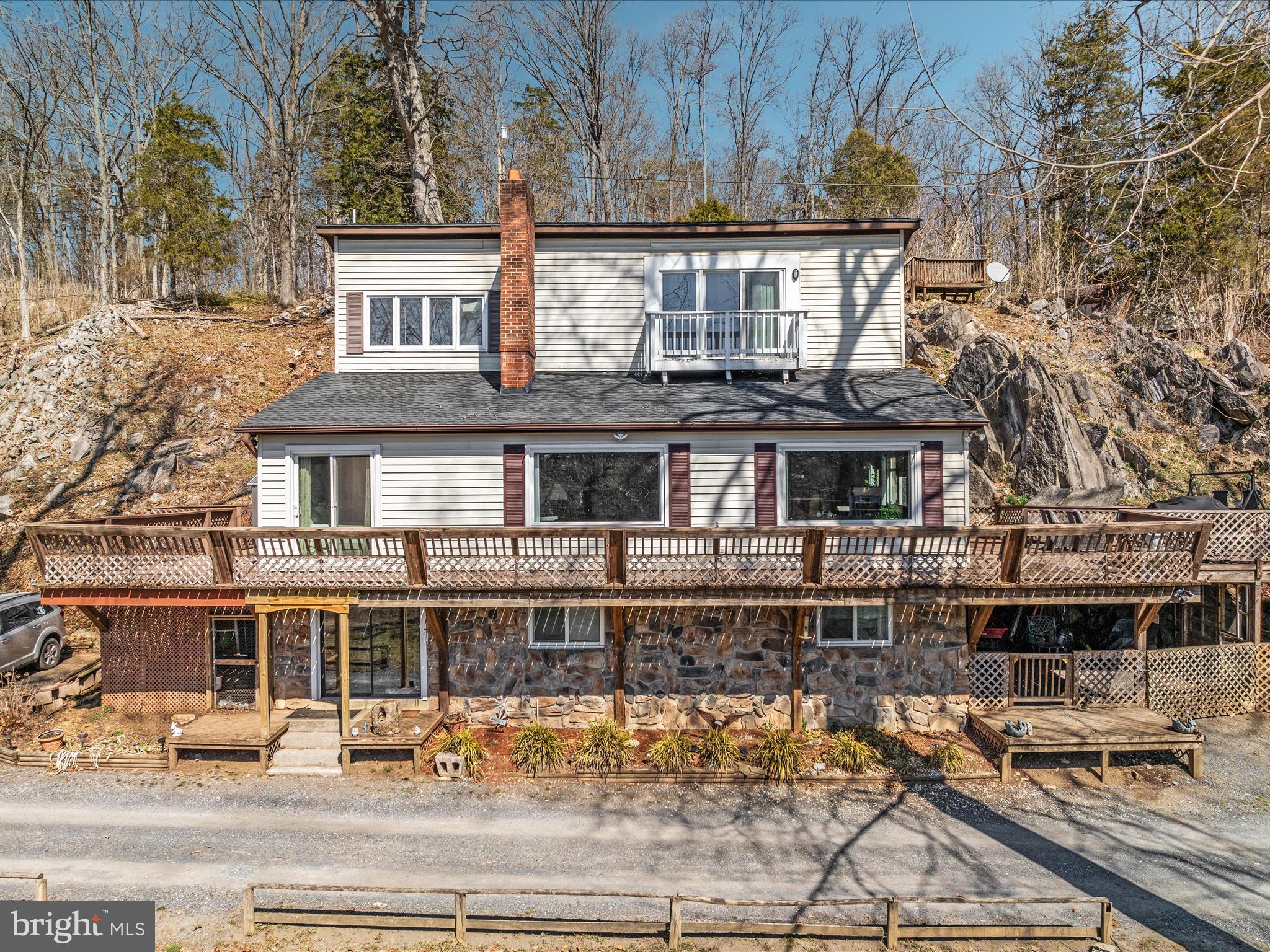 646 Old Dam Road Front Royal, VA 22630 - Photo 78 of 88 front view of a building with a bench