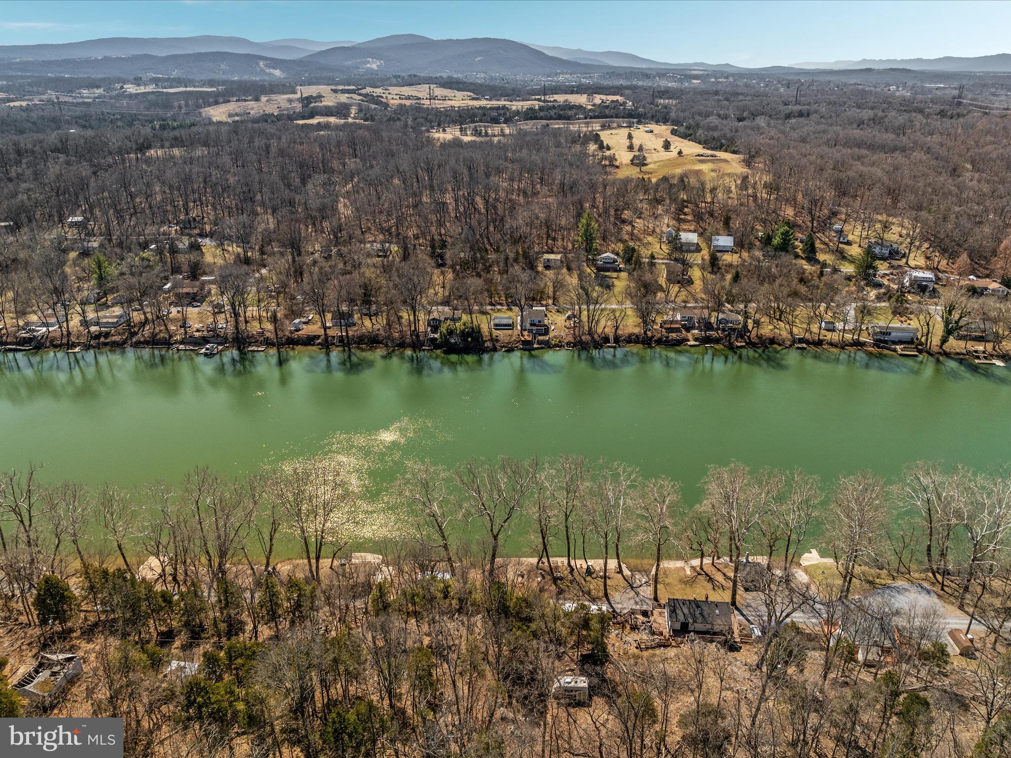 646 Old Dam Road Front Royal, VA 22630 - Photo 79 of 88 a view of a lake with a mountain