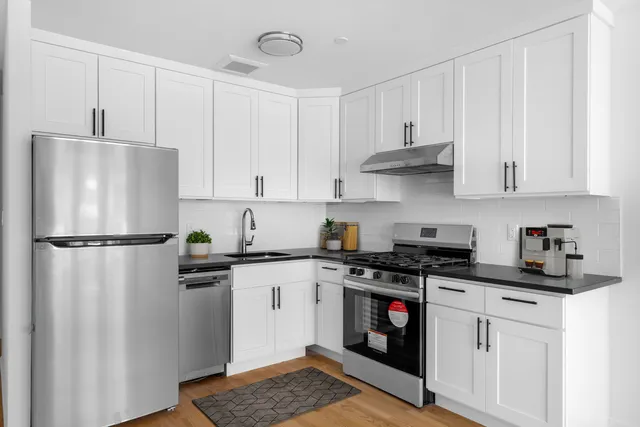 a picture of a bench in front of a door