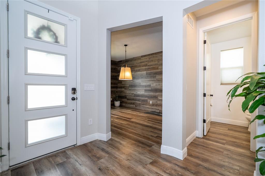 16894 Wingspread Loop Winter Garden, FL 34787 - Photo 11 of 53 wooden floor in a gallery