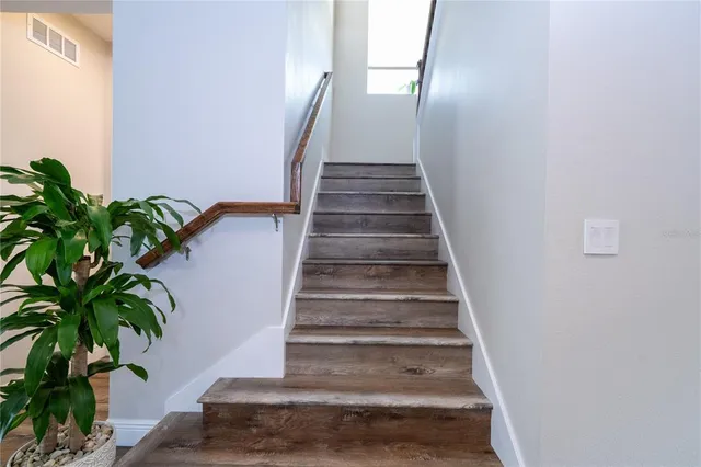 a utility room with washing machine
