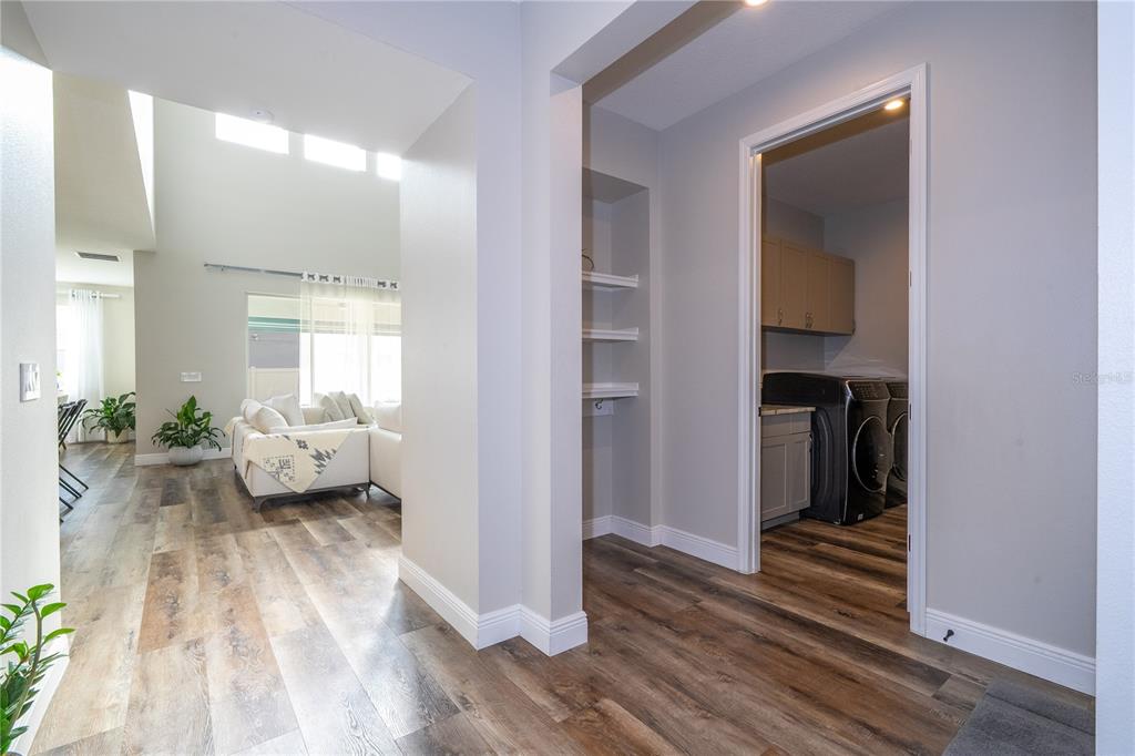 16894 Wingspread Loop Winter Garden, FL 34787 - Photo 16 of 53 a bedroom with furniture and a window