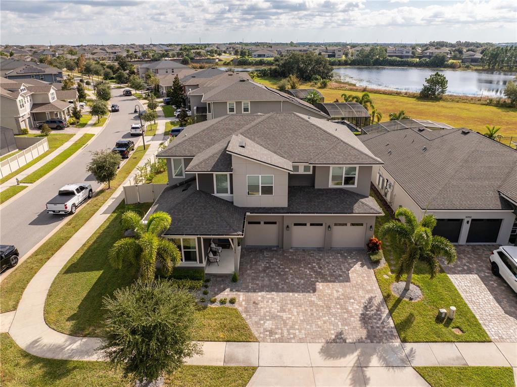 16894 Wingspread Loop Winter Garden, FL 34787 - Photo 3 of 53 an aerial view of a house with a swimming pool and outdoor seating