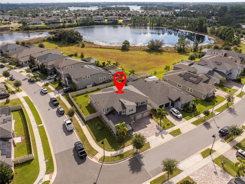 16894 Wingspread Loop Winter Garden, FL 34787 - Photo 4 of 53 an aerial view of residential houses with outdoor space and swimming pool