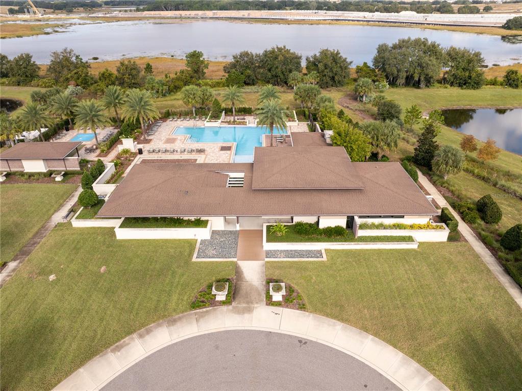 16894 Wingspread Loop Winter Garden, FL 34787 - Photo 47 of 53 a view of a lake with a yard and outdoor space