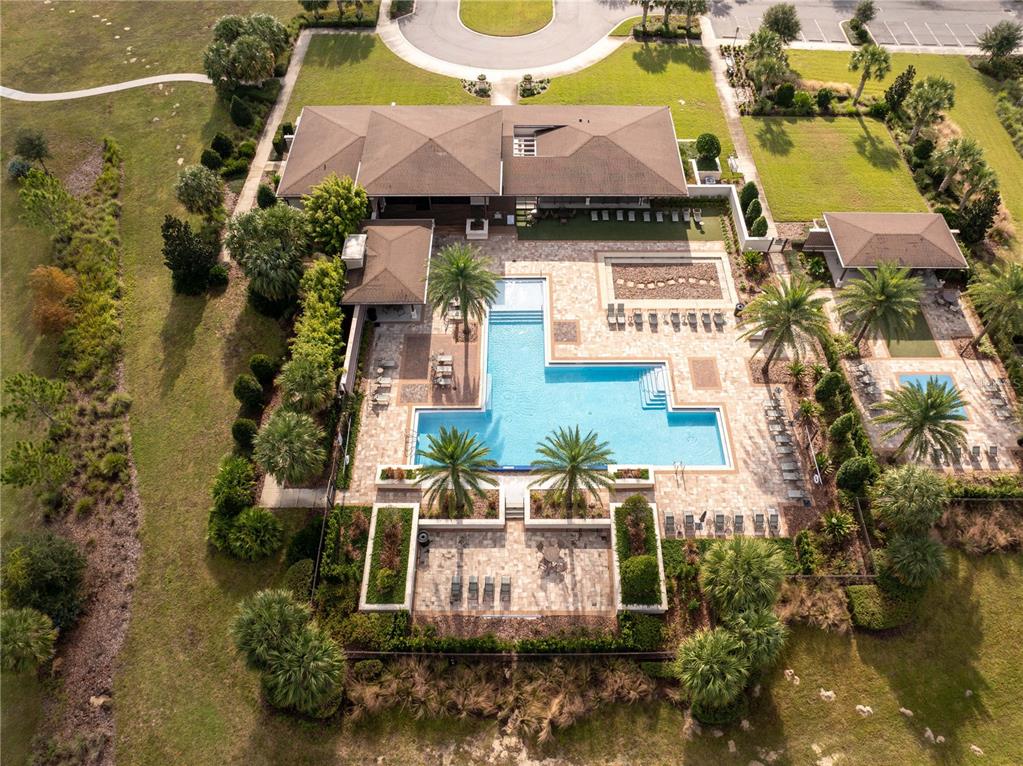 16894 Wingspread Loop Winter Garden, FL 34787 - Photo 48 of 53 an aerial view of a house with yard and parking