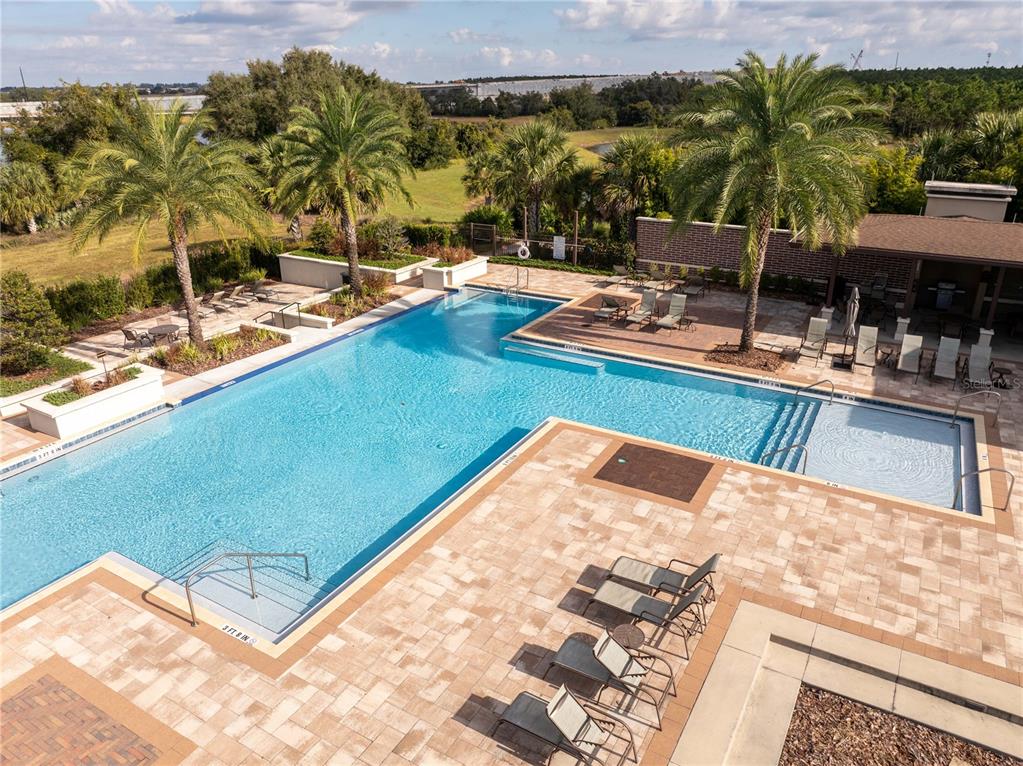 16894 Wingspread Loop Winter Garden, FL 34787 - Photo 49 of 53 a view of a swimming pool with a patio