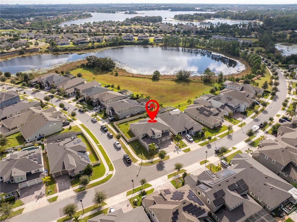 16894 Wingspread Loop Winter Garden, FL 34787 - Photo 53 of 53 an aerial view of residential houses with outdoor space