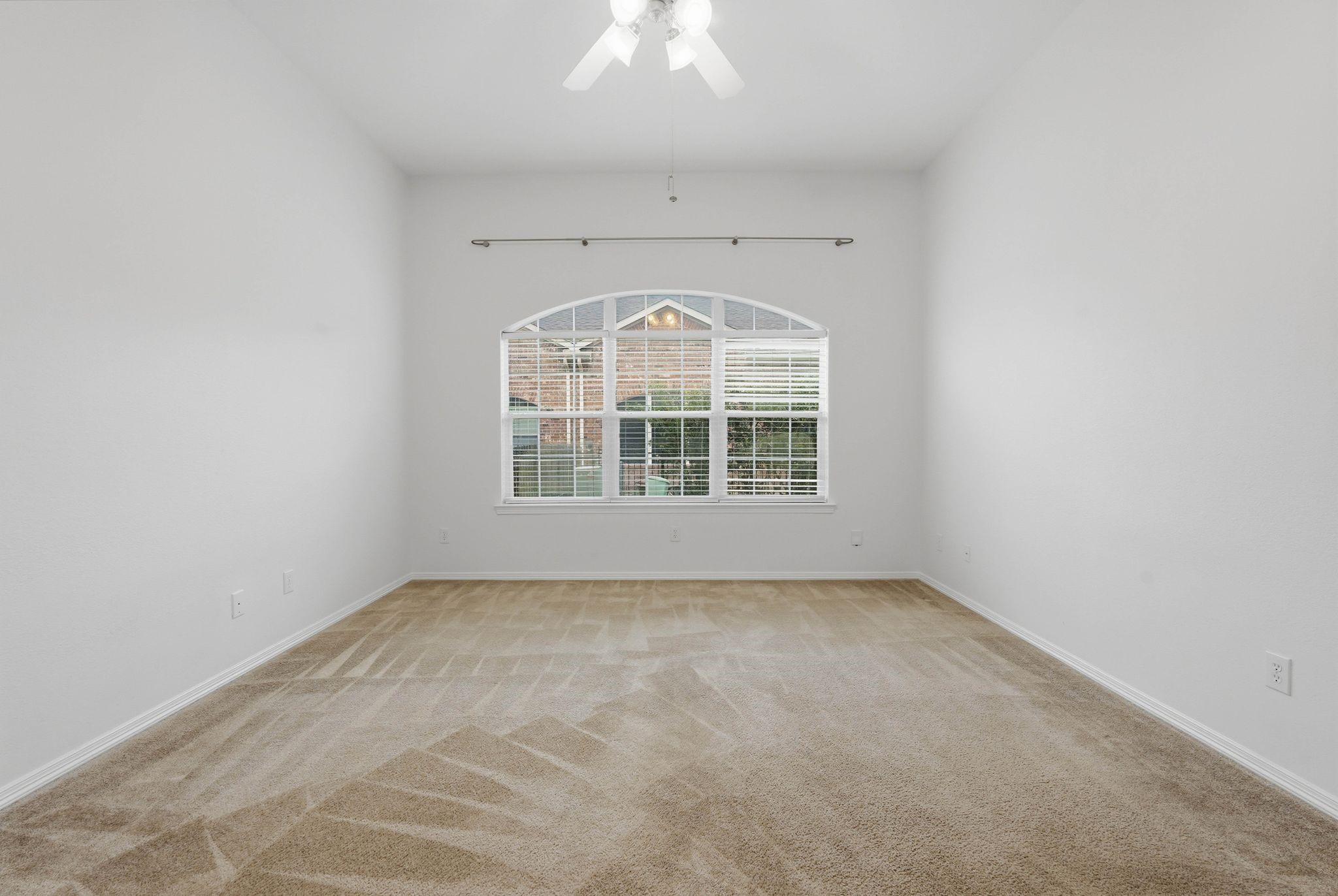 18612 Syndee Loch Court Spring, TX 77379 - Photo 14 of 27 an empty room with a fireplace