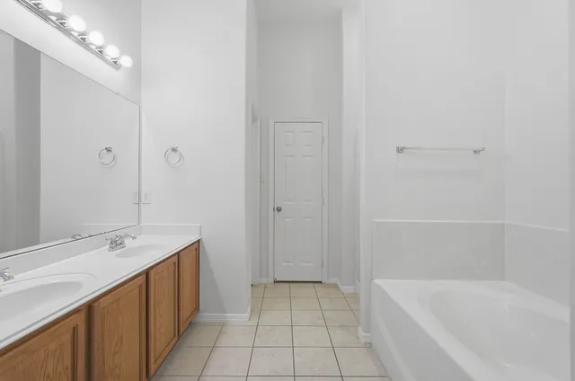 an empty room with a fireplace