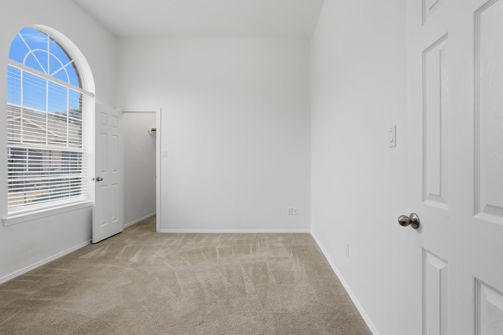 18612 Syndee Loch Court Spring, TX 77379 - Photo 18 of 27 a view of an empty room with a window