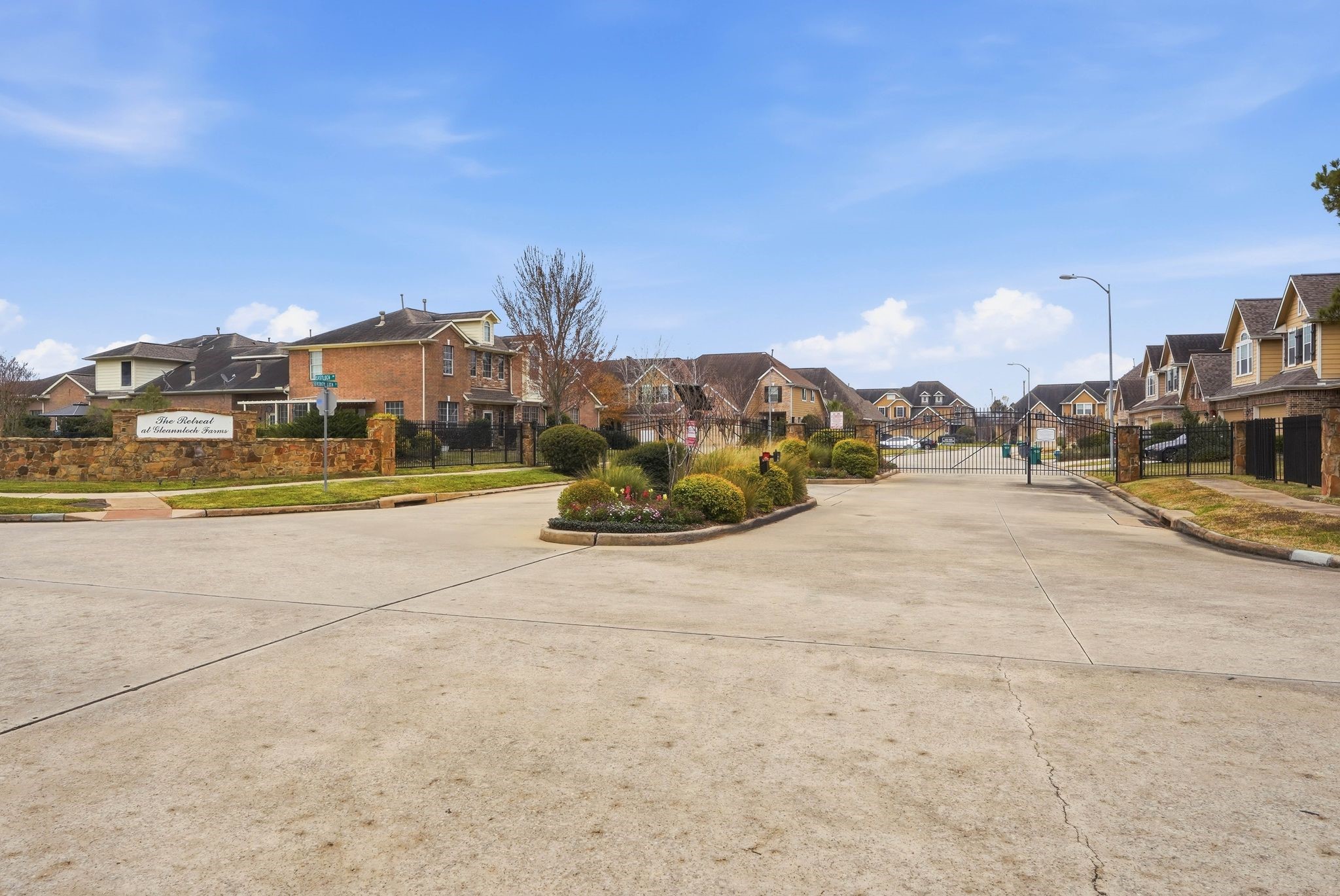 18612 Syndee Loch Court Spring, TX 77379 - Photo 2 of 27 a view of a city with tall buildings