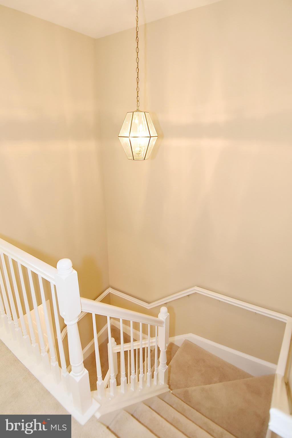 1300 Windleaf Drive, Unit A Reston, VA 20194 - Photo 23 of 30 Stairwell from upper level
