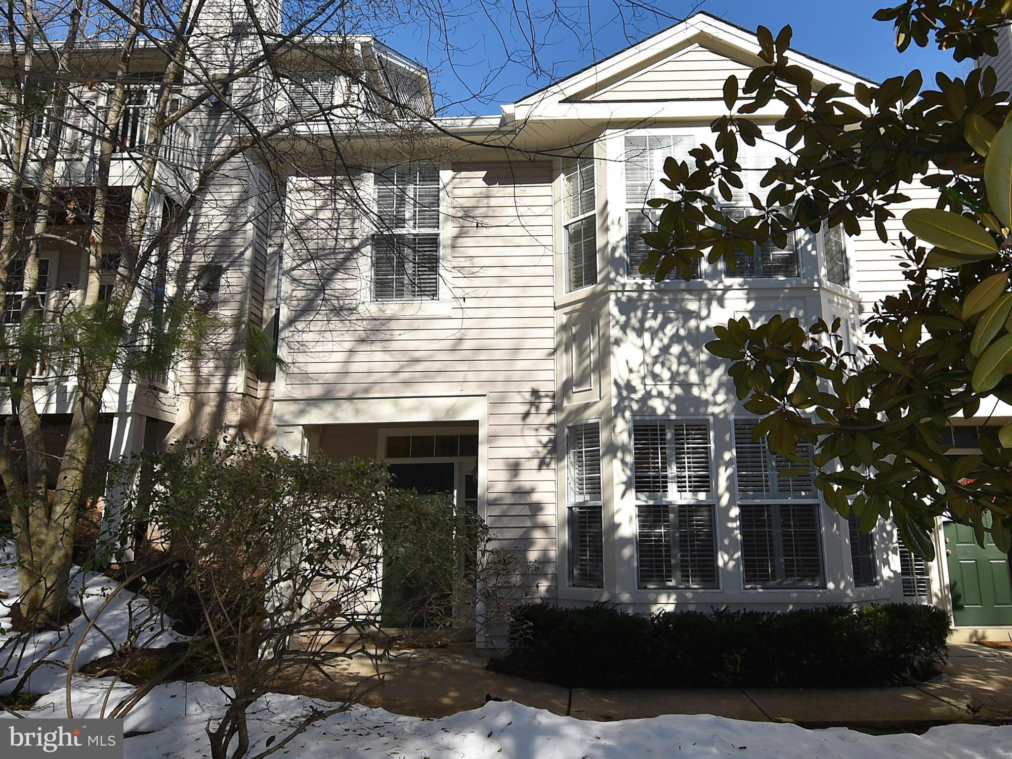 1300 Windleaf Drive, Unit A Reston, VA 20194 - Photo 24 of 30 Front door through trees
