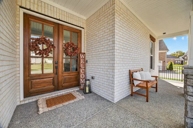 a living room with furniture and a gate