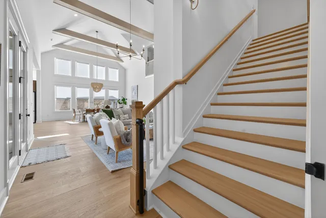 a view of a roof deck with furniture