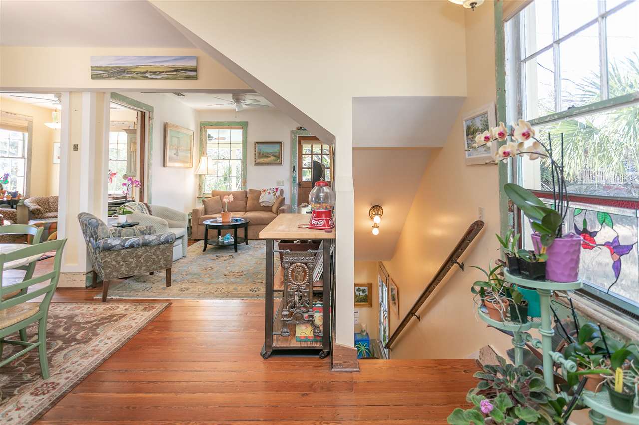 63 Marine Street St. Augustine, FL 32084 - Photo 18 of 42 a living room with furniture and a potted plant