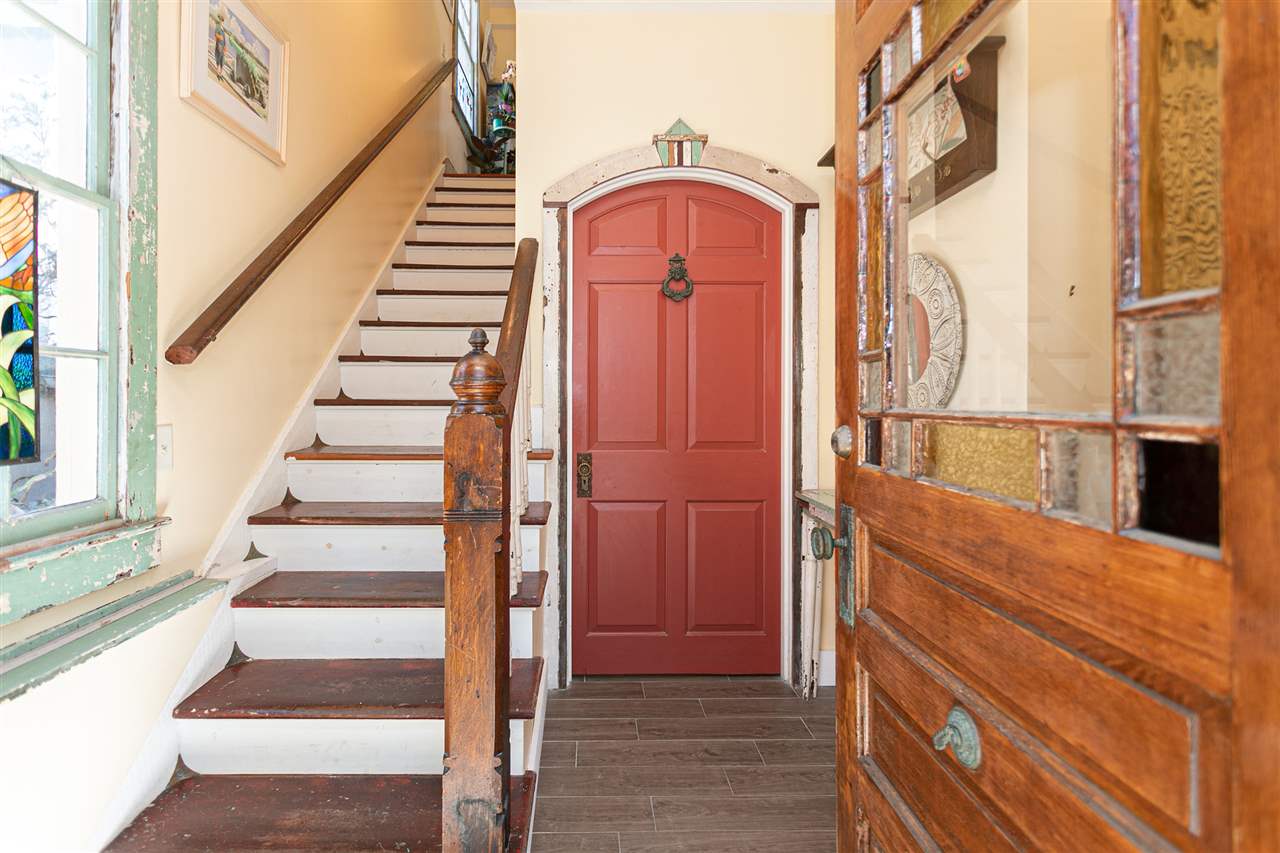63 Marine Street St. Augustine, FL 32084 - Photo 3 of 42 a view of entryway with wooden floor and door