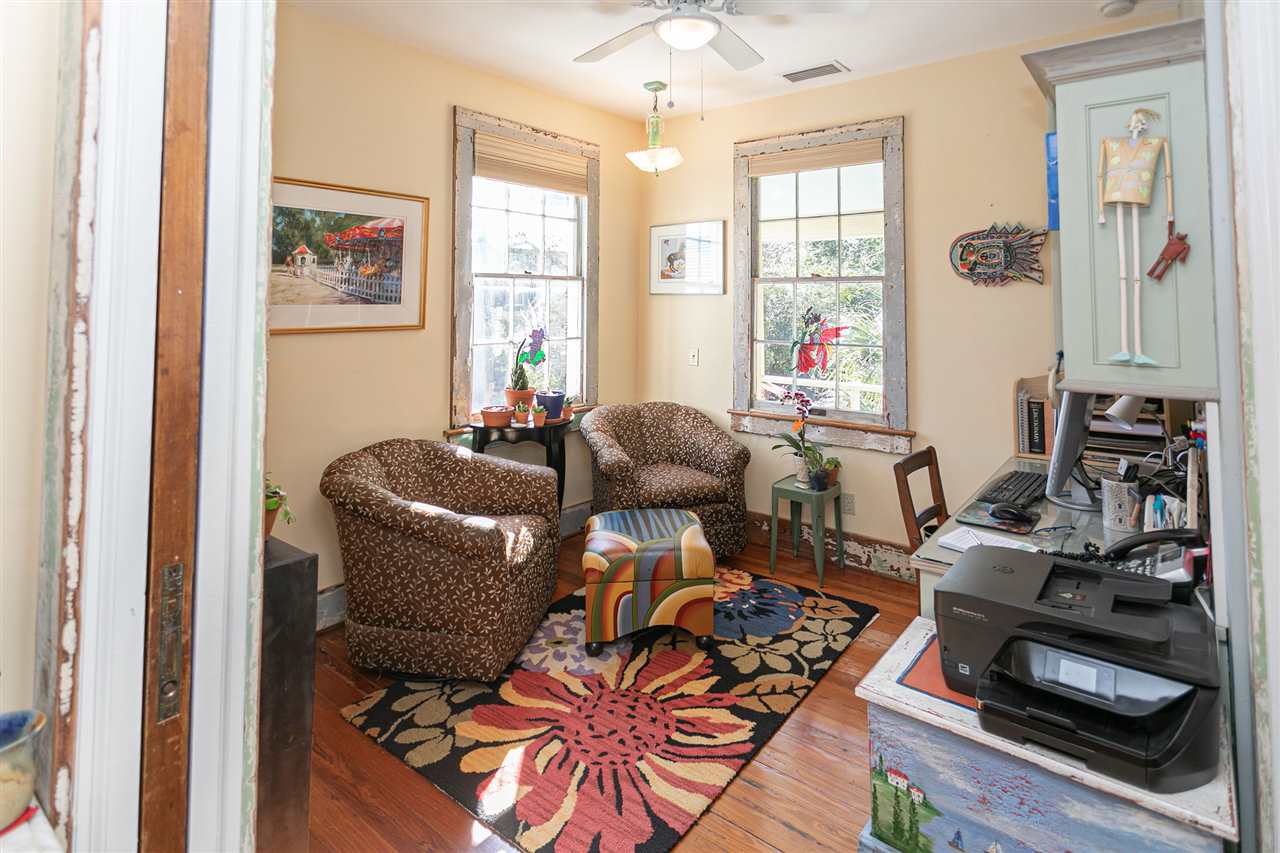 63 Marine Street St. Augustine, FL 32084 - Photo 26 of 42 a living room with furniture and a window
