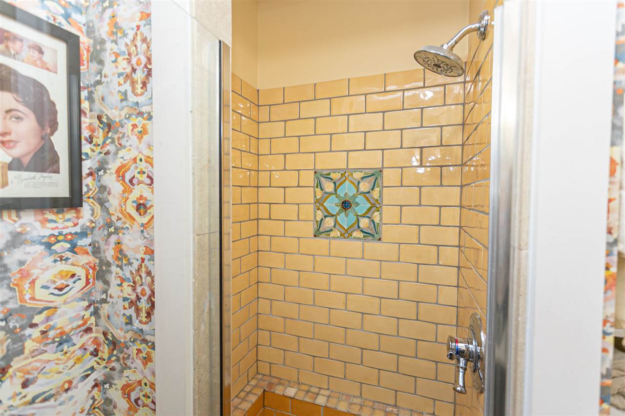 63 Marine Street St. Augustine, FL 32084 - Photo 8 of 42 a bathroom with a shower and a sink