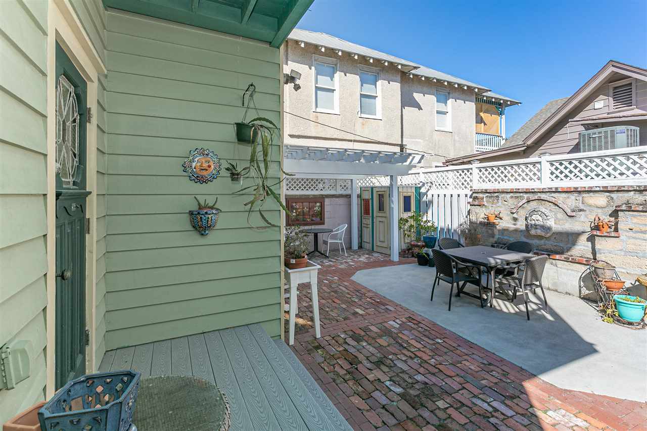 63 Marine Street St. Augustine, FL 32084 - Photo 10 of 42 a view of a house with backyard and sitting area
