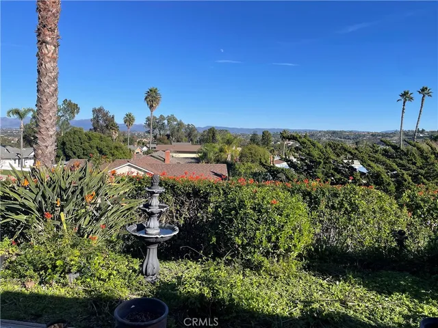 a view of a backyard of a house