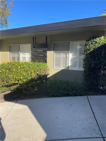 a view of a backyard of the house