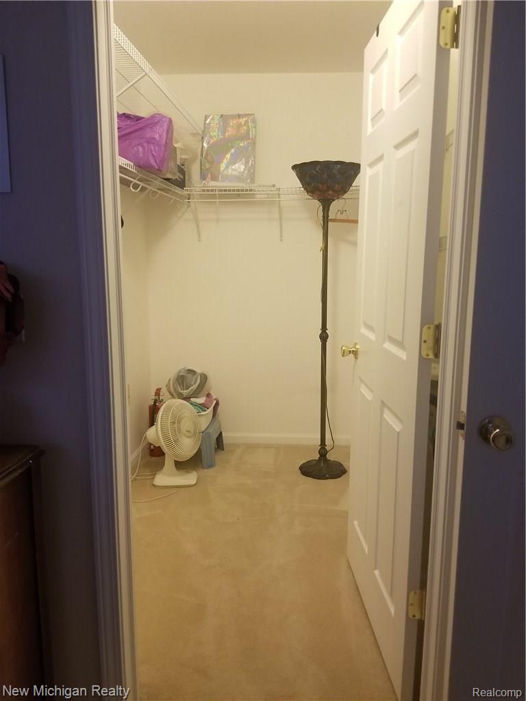45960 Rhodes Drive Macomb, MI 48044 - Photo 10 of 18 Master bedroom walk-in closet