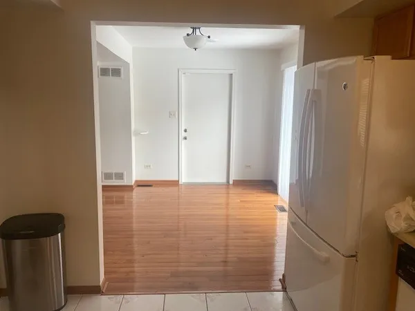 a bathroom with a shower and a sink