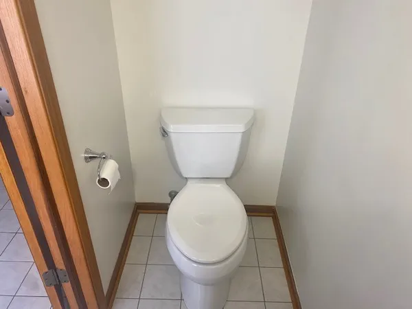 a bathroom with a toilet and a sink