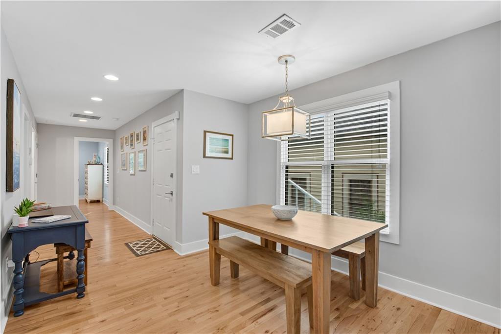 114 Tye Street Southeast Atlanta, GA 30316 - Photo 15 of 48 a workspace with furniture window and wooden floor