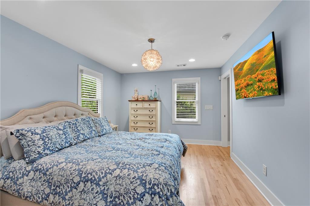 114 Tye Street Southeast Atlanta, GA 30316 - Photo 20 of 48 a bedroom with a bed and a window