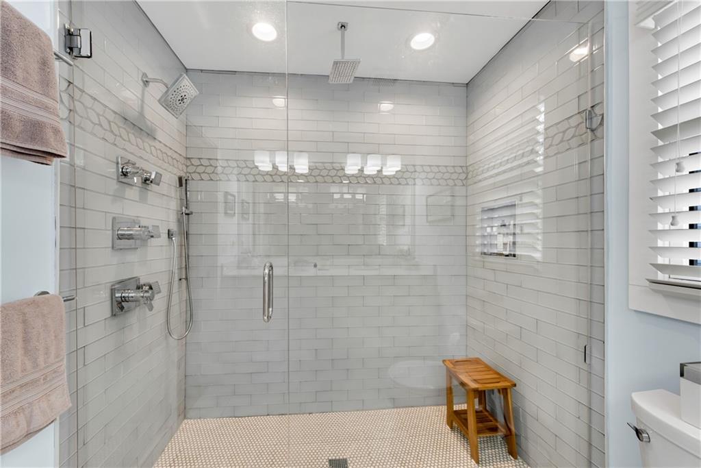 114 Tye Street Southeast Atlanta, GA 30316 - Photo 24 of 48 a bathroom with a shower and toilet