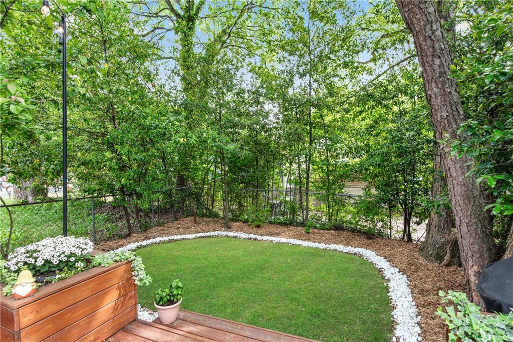 114 Tye Street Southeast Atlanta, GA 30316 - Photo 34 of 48 a view of a backyard with a garden