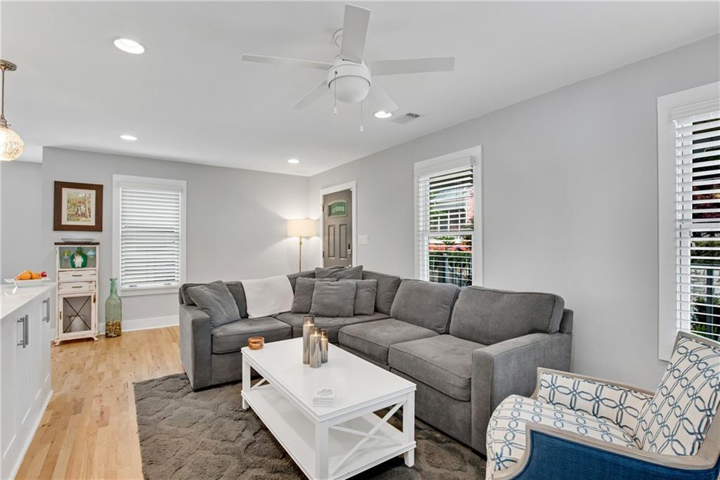 114 Tye Street Southeast Atlanta, GA 30316 - Photo 9 of 48 a living room with furniture and a couch