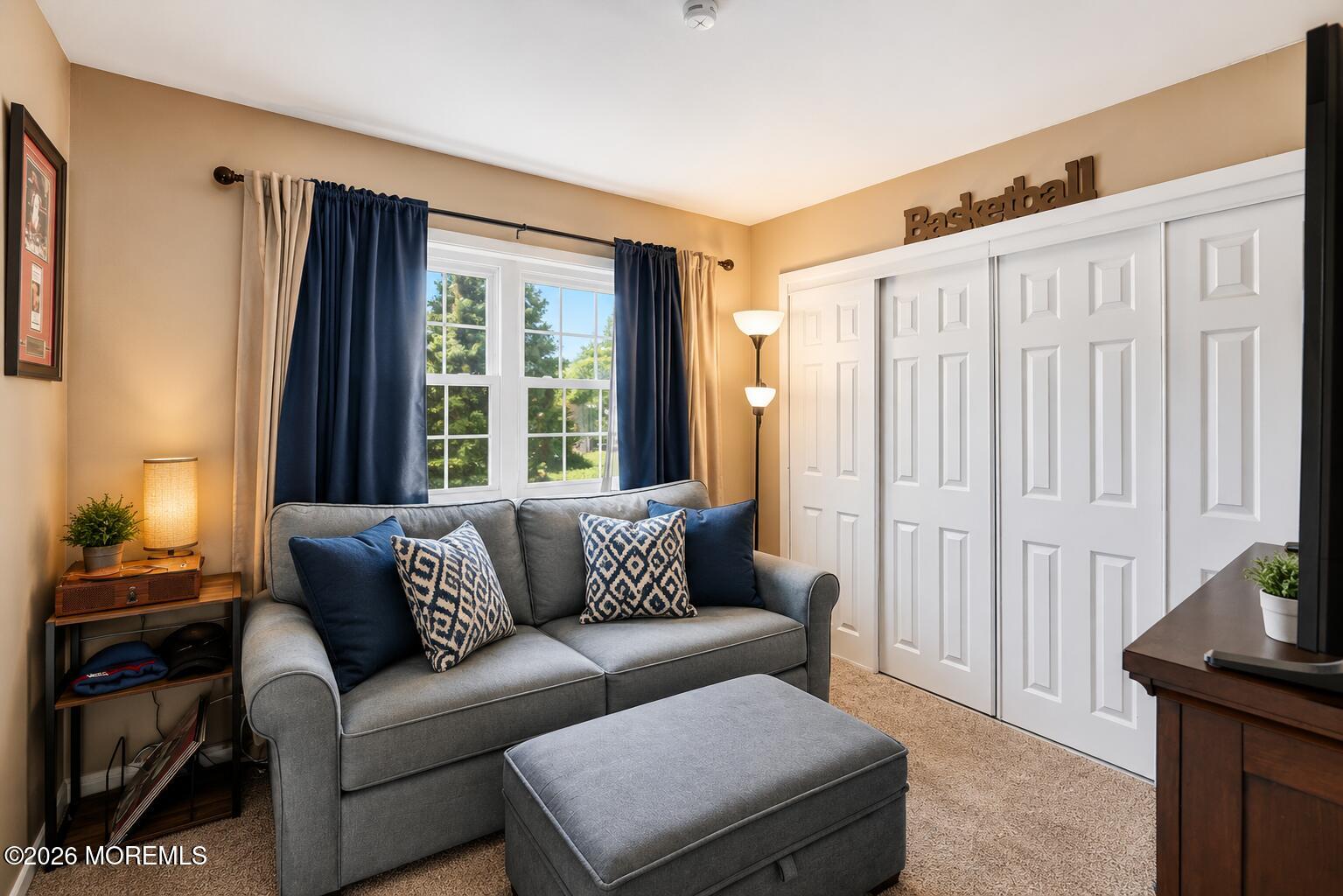 22 Ethan Allen Road Freehold, NJ 07728 - Photo 21 of 31 a living room with furniture and a window