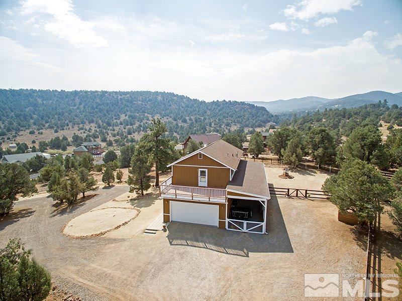 2280 Lousetown Road Reno, NV 89521 - Photo 1 of 1 an aerial view of a house with a mountain view