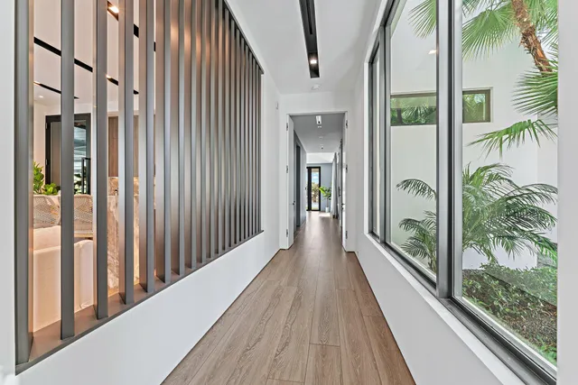 a kitchen with a dining table and chairs
