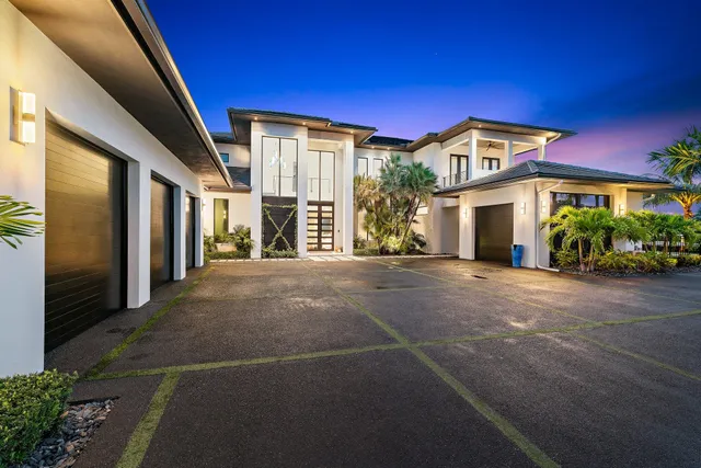 a view of a house with a street