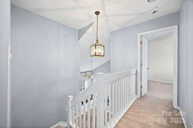a view of a hallway with entryway
